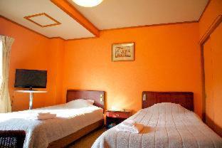 City Pension Tommy Rich Inn Quioto Quarto foto