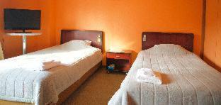 City Pension Tommy Rich Inn Quioto Quarto foto