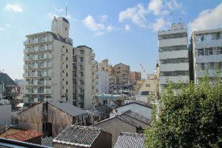 City Pension Tommy Rich Inn Quioto Quarto foto